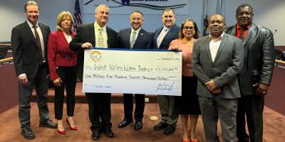 Supervisor Joe Baca Jr. Presents Check to the WVWD Board of Directors 